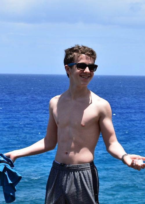 Ethan Wacker shirtless body on display in June 2018