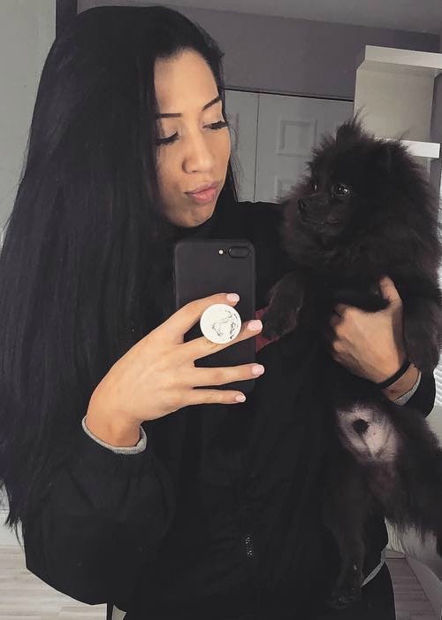 Indi Hartwell in a selfie with her dog in April 2018