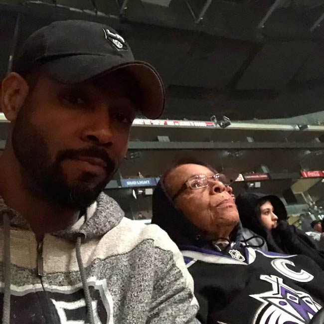 Isaiah Mustafa with his mother watching LA Kings Hockey match in February 2018