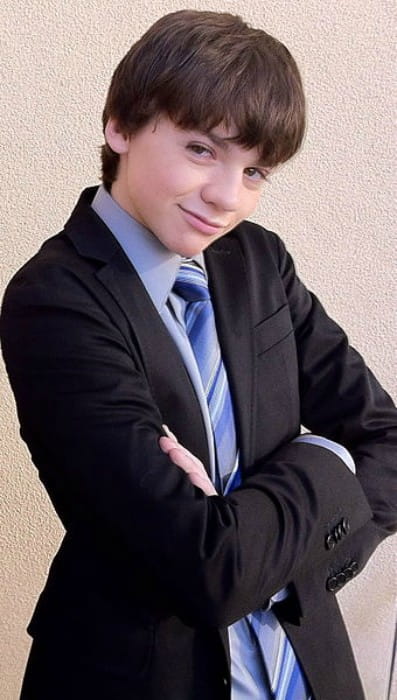 Joel Courtney at a red carpet event in January 2012