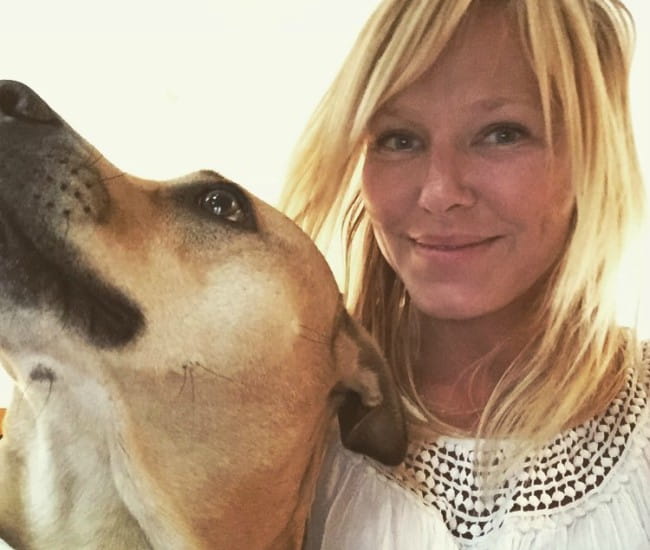 Kelli Giddish with her dog as seen in June 2017