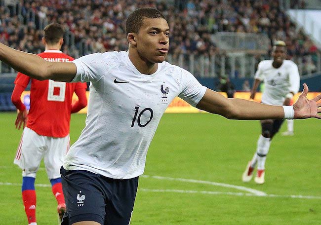 Kylian Mbappe celebrating his second goal for France on March 27, 2018