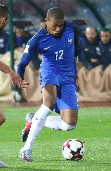 Kylian Mbappé in action in a football match in October 2017
