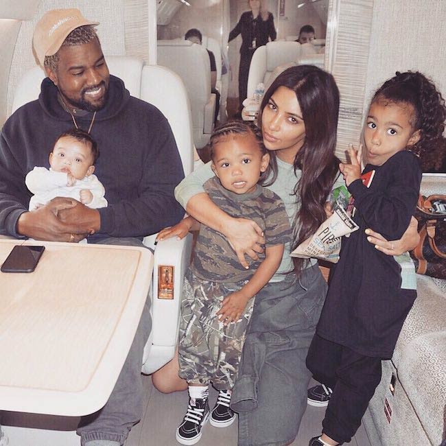 North West with her father Kanye mother Kim and siblings in April 2018