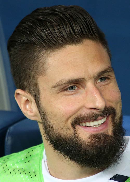 Olivier Giroud smiling after winning the match against Russia in 2018