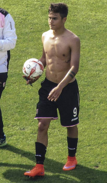 Paulo Dybala shirtless on football ground in May 2015