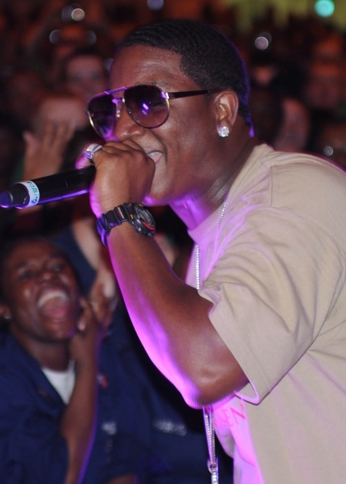 Rapper Yung Joc performing in a concert aboard the aircraft carrier USS Dwight D. Eisenhower (CVN 69) in April 2009