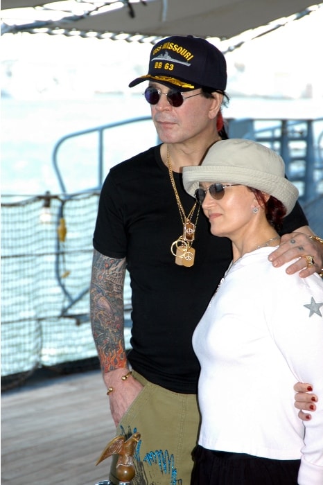 Sharon Osbourne touring the battleship USS Missouri (BB 63) at Pearl Harbor, Hawaii, with her husband Ozzy Osbourne while filming their MTV show 'The Osbournes'