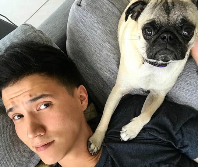 Aaron Burriss in a selfie with his dog as seen in May 2018