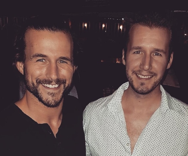 Adam Cole (Left) with his younger brother Brent Jenkins in July 2017