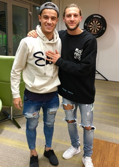 Adam Lallana (Right) with Philippe Coutinho in January 2018