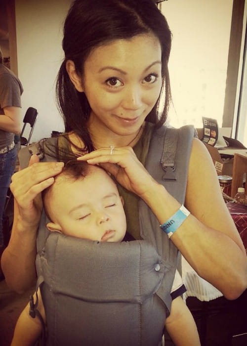 Brittany Ishibashi in an Instagram post in with her son as seen in December 2014