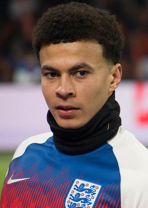 Dele Alli clicked wearing Nike shirt in the football ground in 2018