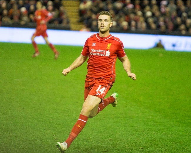 Jordan Henderson while playing for Liverpool F.C. against Arsenal in a Premier League match in December 2014