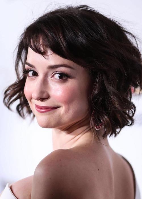 Milana Vayntrub smiling during a picture clicked at Chateau Marmont Hotel in February 2017