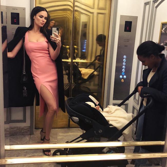 Nicole Trunfio in a mirror selfie inside the elevator in July 2018