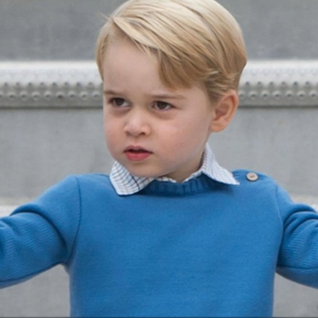 Prince George sporting a blue attire