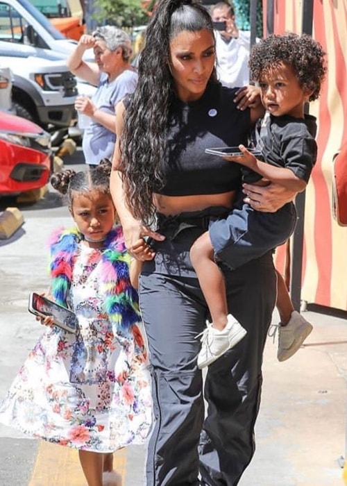 Saint West with mother Kim Kardashian West and older sister North