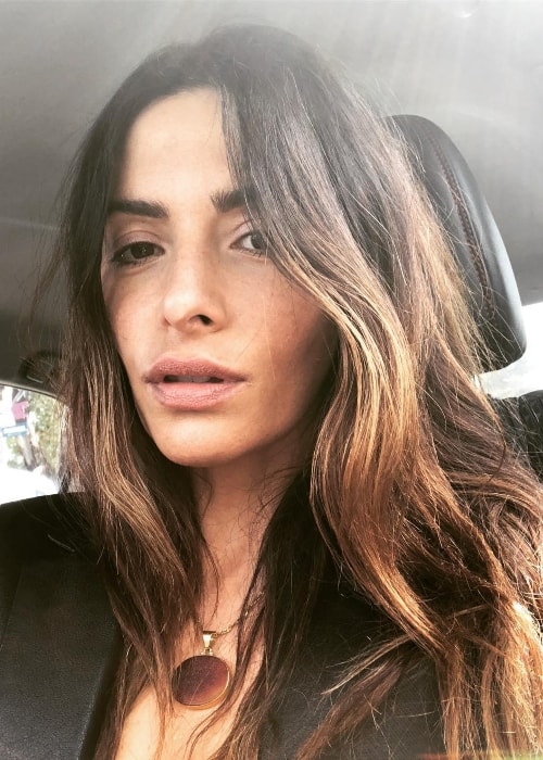 Sarah Shahi sporting her mother's necklace in a selfie in June 2018