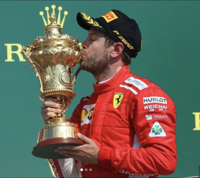 Sebastian Vettel celebrating F1 British Grand Prix with Trophy in July 2018