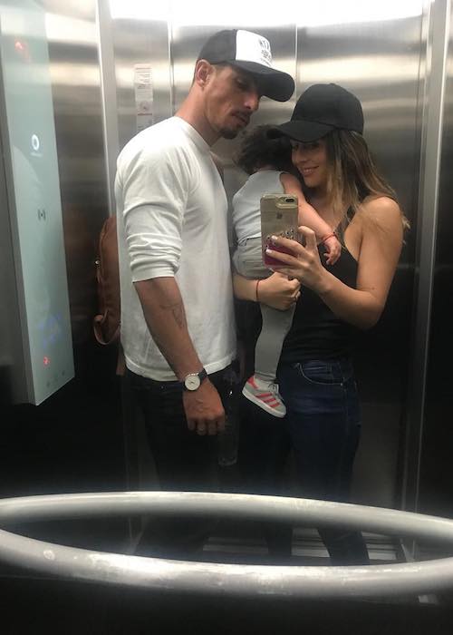 Zuria Vega with Alberto Guerra and their daughter inside the elevator in May 2018