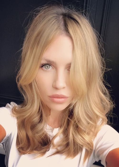 Abbey Clancy showing her lustrous hair as she was announced as the brand ambassador for Provoke hair in June 2018