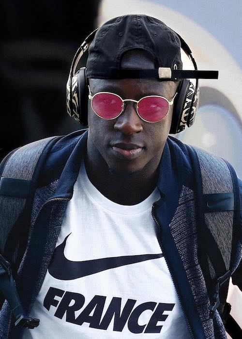 Benjamin Mendy looks dapper while listening to songs and wearing Nike t-shirt in July 2018