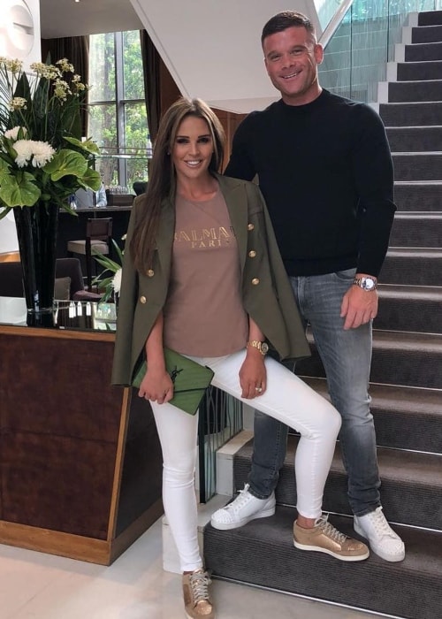 Danielle Lloyd at Canary Riverside Plaza with Michael O'Neill in June 2018