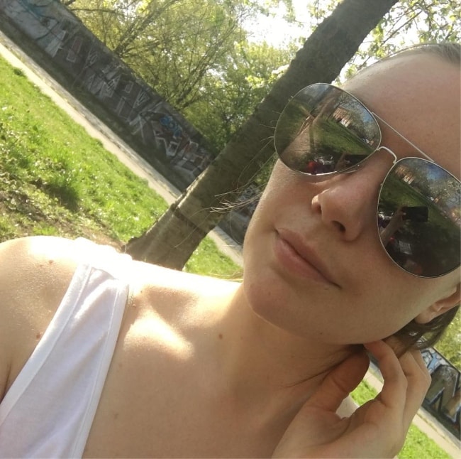 Emika embracing the sunshine in a selfie in April 2018