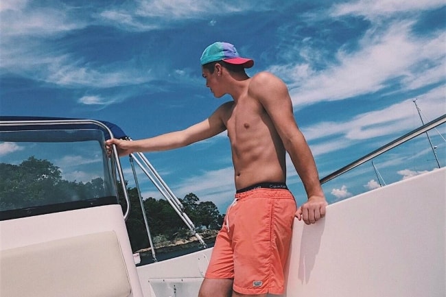 Joey Kisluk posing on a boat in July 2017