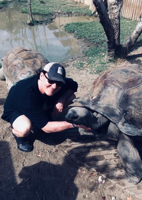 John Cusack pictured with a tortoise in March 2018