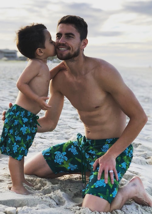 Jorginho shirtless enjoying his time with his son at Beach Park Water Resort