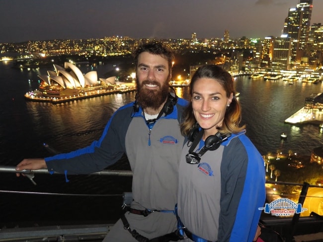 Lauren Wells with her husband Heath Wells atop the Sydney Harbour Bridge