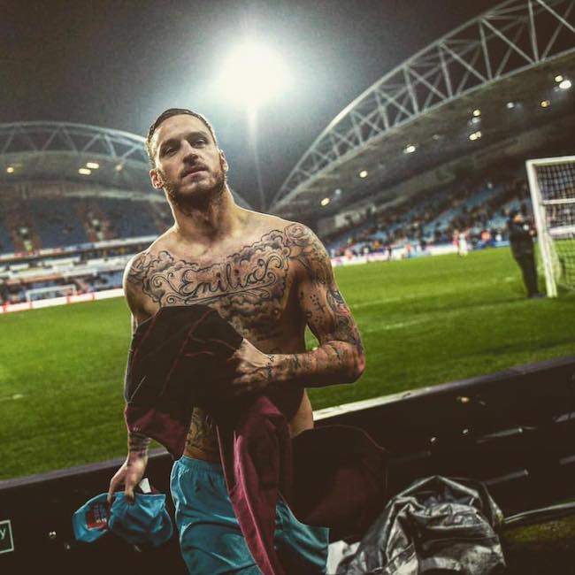 Marko Arnautovic shirtless showing his tattooed body in January 2018