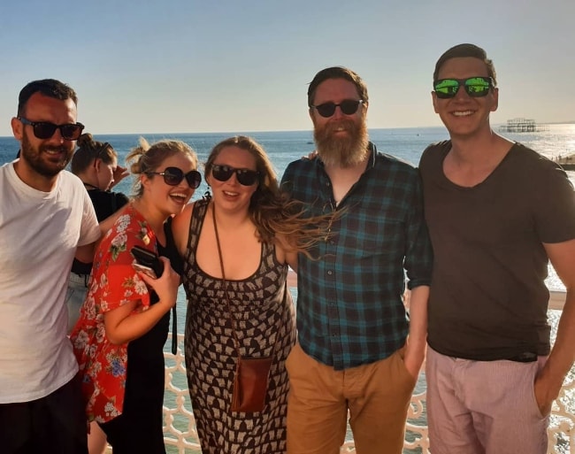 Oliver Phelps (Corner Right) at the seaside with his friends in June 2018