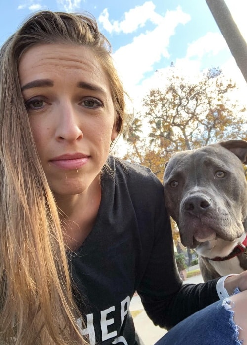 Rachel Ballinger with her dog Blaze during a walk in January 2018