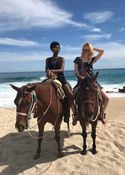 Amilna Estevão (Left) and Katie Moore as seen on horse-backs by the beach in April 2018