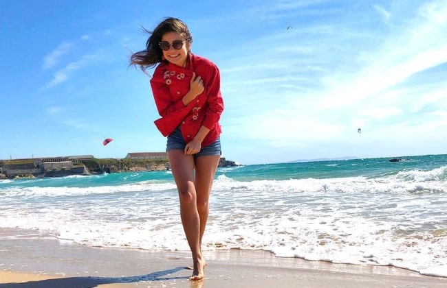 Ayça Ayşin on a beach in June 2018