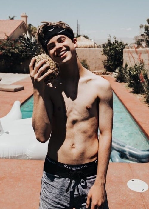 Chase Keith posing shirtless in July 2018