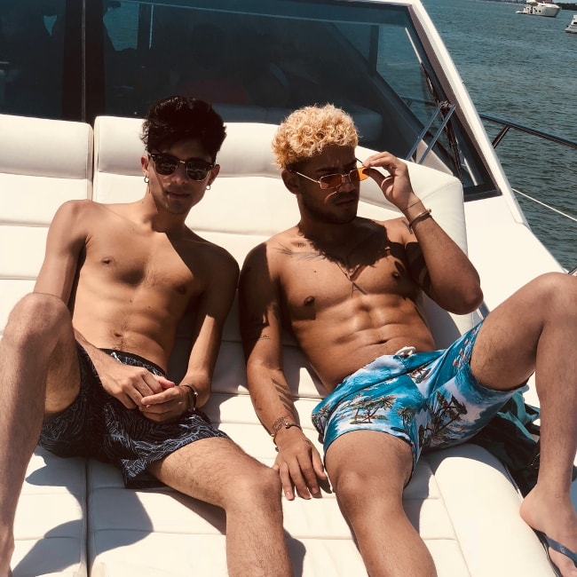 Erick Brian Colón (Left) posing shirtless with his pal Richard Camacho in July 2018