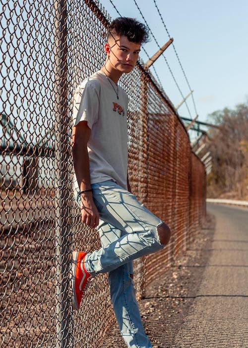 Ian Jeffrey posing for a picture beside mesh wire in May 2018