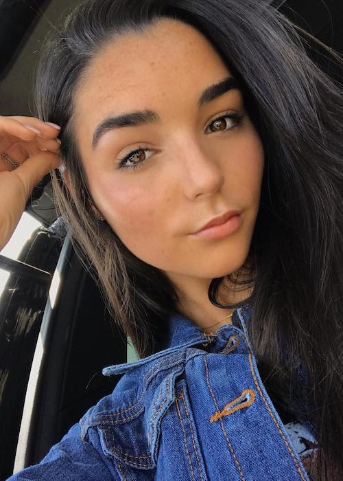 Indiana Massara wearing blue jeans in a selfie in August 2018