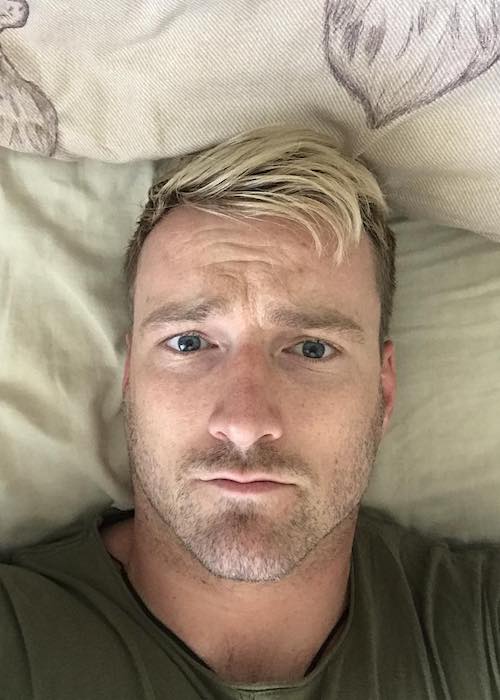 Jai McDowall lying down after his workout session at TA Fitness in June 2018