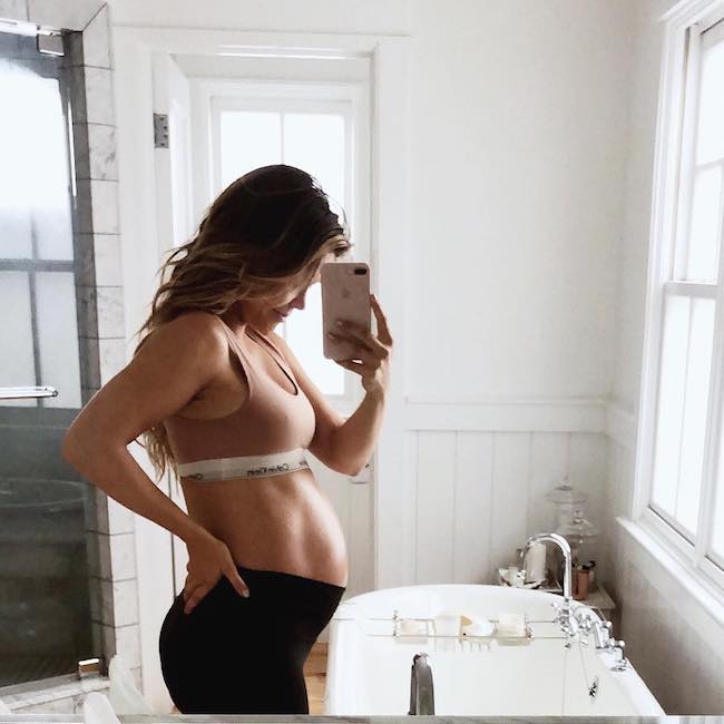 Katrina Scott showing her baby bump 8 months into pregnancy in August 2018