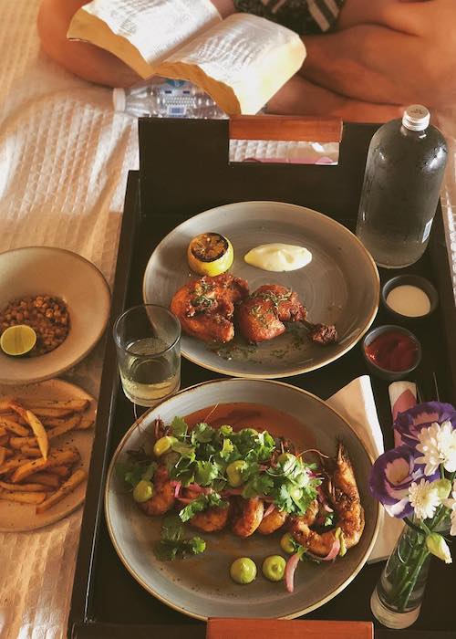 Kevin McHale enjoying food at El Pez Hotel Tulum in June 2018