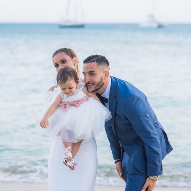 Kostas Manolas with Niki Prevezanou and their daughter in July 2018