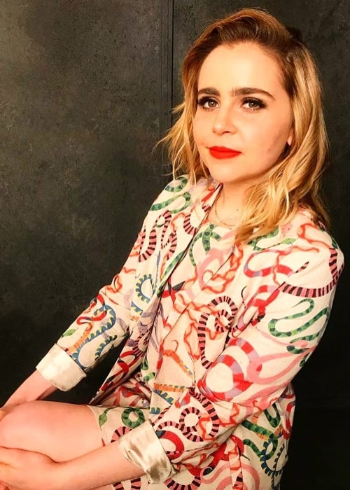 Mae Whitman as seen in a snake print dress in March 2018