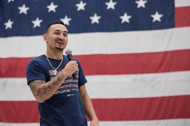 Max Blessed Holloway answers questions during a show for troops at Bagram Air Field in Afghanistan in April 2018