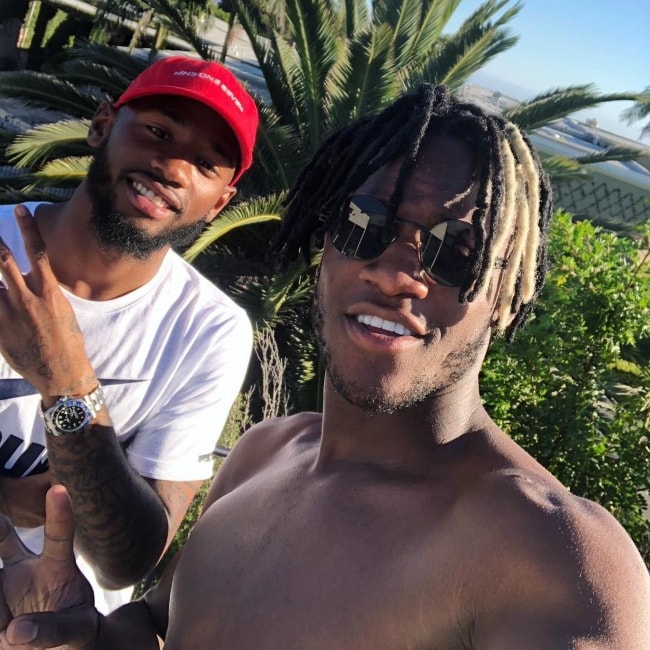 Michy Batshuayi (Right) in a selfie with GK Nkoudou in July 2018