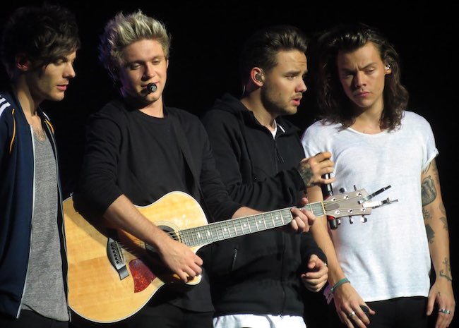 One Direction while giving a performance in Glasgow in 2015